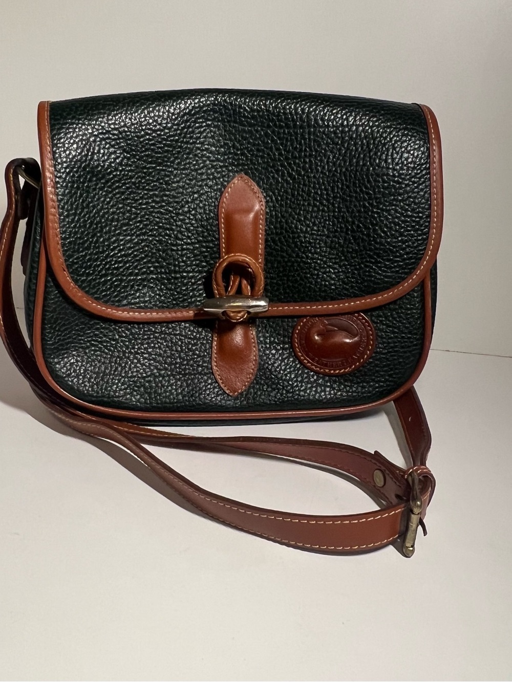 Dooney & Bourke Black Pebbled Leather Crossbody with Brown Trim and Strap